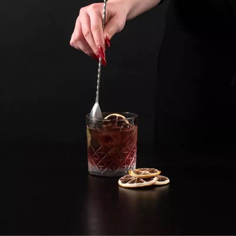 spoon glass of cocktail mixed with a shaker