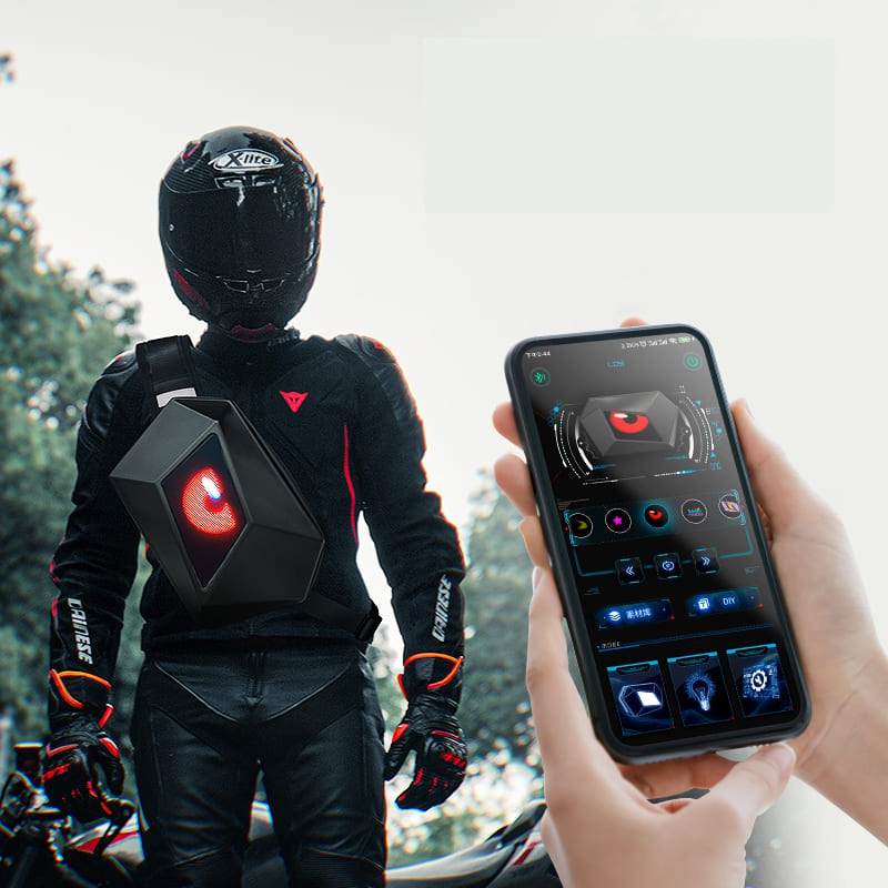 backpack with a display for a motorcycle with a light-up LED pocket, a body bag