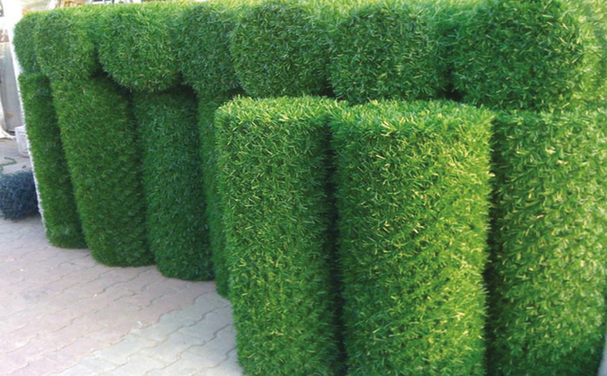 roll of artificial grass fence made of living grass fence imitation of lawn