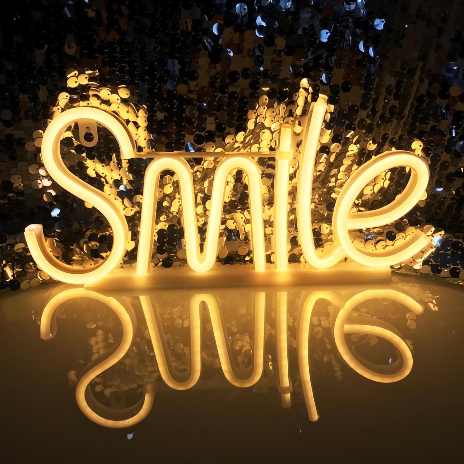 Smile led glowing sign on the wall neon light