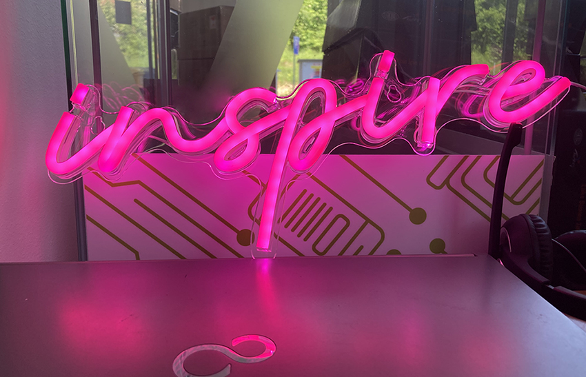 INSPIRE sign on the wall LED light neon hanging