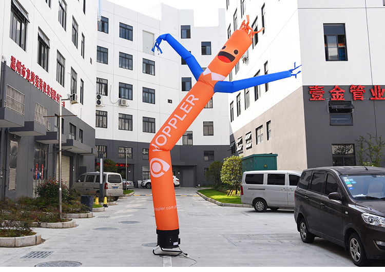 Dancing, inflatable waving man with a fan sky air ballon dancer